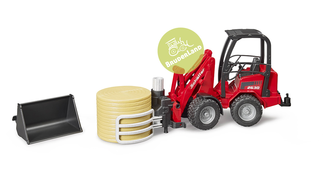 Schäffer Hoflader 2034 s adaptéry (klaště na balíky + lopata) - Bruder 2192 